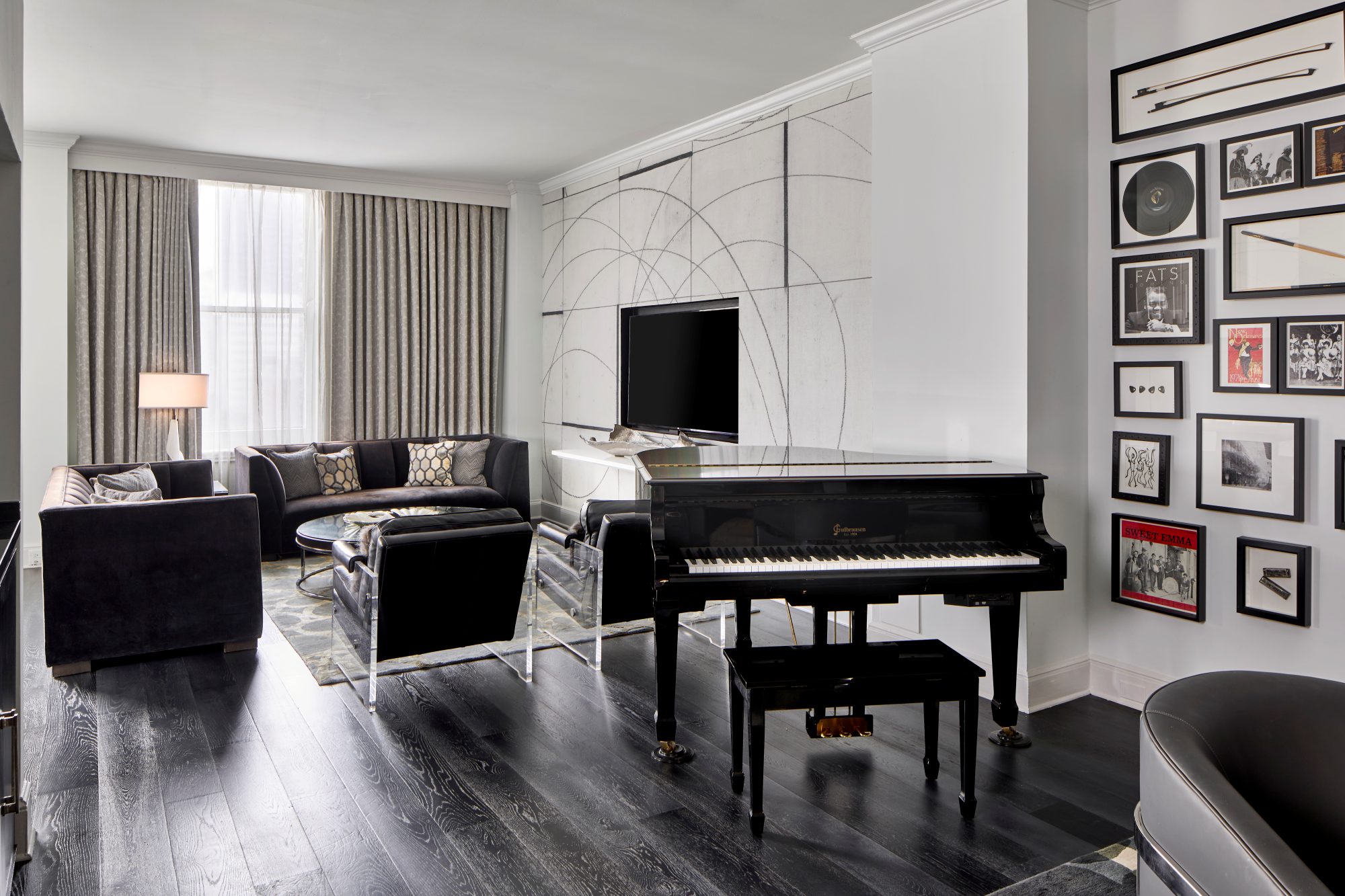 a room with a piano and a couch